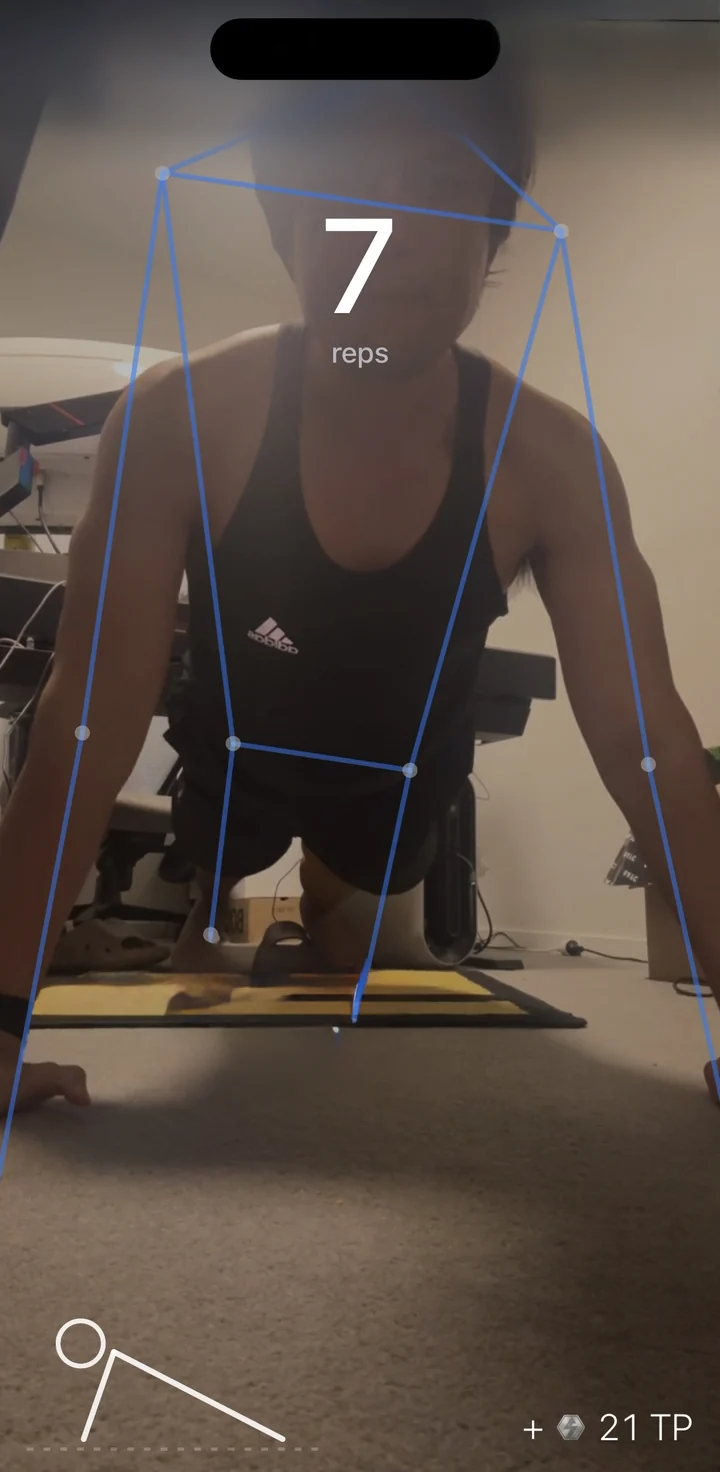 The camera session counting push-ups with a skeleton drawn over the body